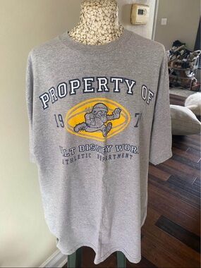 Vintage Grumpy Disney Gray Short-Sleeve Tee with Football graphic